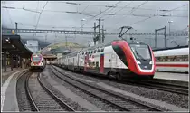 RE3478 mit 511 021 nach Zürich via Ziegelbrücke und IR RABDe 502 009-9  St.Gallen  nach Zürich via St.Gallen in Chur. (10.12.2018)