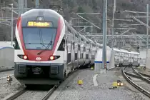 Nachschuss nach der Ausfahrt in Visp, RABe 511 019 und 116, am 25.12.18.