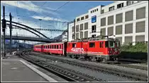 RE1728 aus Disentis mit Ge 4/4 II 628  S-chanf  fährt in Chur ein. (28.12.2018)