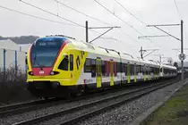 Doppeltraktion, mit den Flirt 521 023 und 521 017 mit der Werbung für die Fachhochschule Muttenz, auf der S3, fährt Richtung Bahnhof Itingen. Die Aufnahme stammt vom 02.01.2019.