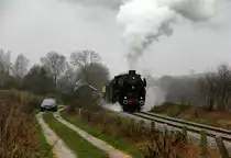 01 1075 von SSN kommt mit einem Sonderzug aus Schin-op-Geul(NL) nach Simpelveld(NL) und kommt durch Eys-Wittem(NL) und fährt in Richtung Simpelveld(NL).
Aufgenommen von einem Feldweg in Eys-Wittem(NL). 
Bei Regenwolken am Kalten Nachmittag vom 31.12.2018.