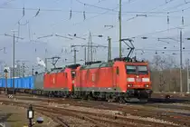 Doppeltraktion, mit den DB Loks 185 096-5 und 185 123-7, durchfährt den badischen Bahnhof. Die Aufnahme stammt vom 23.01.2019. 