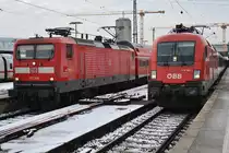 112 106 trifft am 4.1.2019 mit der RB19968 nach Heilbronn Hauptbahnhof im Stuttgarter Hauptbahnhof auf 1116 194 mit dem IC185	nach Zürich HB.