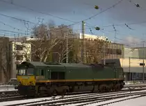 Die Class 66 266 031-4 von Railtraxx rangiert in Aachen-West. 
Aufgenommen vom Bahnsteig in Aachen-West. 
Bei Sonne und Schnee am Kalten Nachmittag vom 31.1.2019.