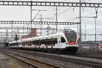 RABe 523 007, auf der S3, verlässt den Bahnhof Muttenz. Die Aufnahme stammt vom 28.01.2019.