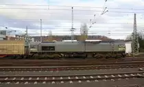 Die Class 66 266 035-5 von Railtraxx fährt mit einem Güterzug aus Linz-Voestalpine(A) nach Antwerpen-Waaslandhaven(B) bei der Abfahrt aus Aachen-West und fährt in Richtung Montzen/Belgien. 
Aufgenommen vom Bahnsteig in Aachen-West. 
Bei Sonne und Wolken am Nachmittag vom 6.2.2019.
