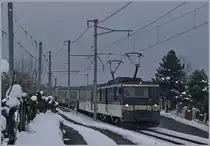 An einem trüben Wintertag zieht die MOB GDe 4/4 6004  Interlaken  den MOB Belle Epoque Zug bei Planchamp Richtung Zweisimmen.
23. Jan. 2017