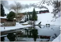 Am Fischteich nahe Cranzahl vorbei, dampft 99 1794 der Fichtelbergbahn von Cranzahl nach Kurort Oberwiesenthal. Leider hatte ich nur das 24mm Objektiv auf der Kamera, sodass ich Kompromisse beim Schnitt eingehen musste.  
01.02.2019