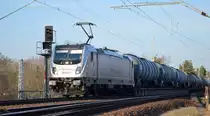 RheinCargo GmbH & Co. KG mit  187 078-1  [NVR-Number: 91 80 6187 078-1 D-RHC] und Kesselwagenzug am 14.02.19 Berlin-Wuhlheide.