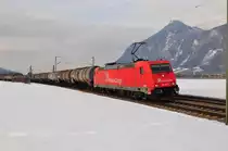 RheinCargo 185 603-8 zieht ein Kesselzug am 21.02.19 bei Oberaudorf in Richtung Kufstein.