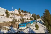 ARB BDhe 2/4 13 mit Bt 23 und Kkm 67 am 16. Februar 2019 auf Talfahrt zwischen Rigi Kulm und Rigi Staffel.
