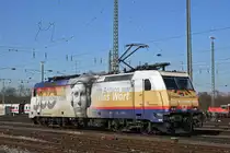 Lok 185 589-9 mit der Werbung für 500 Jahre Reformation, wird auf einem Nebengleis beim badischen Bahnhof abgestellt. Die Aufnahme stammt vom 26.02.2019.