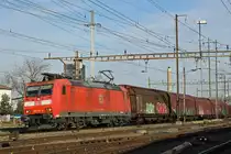 DB Lok 185 127-8 durchfährt den Bahnhof Pratteln. Die Aufnahme stammt vom 21.02.2019.