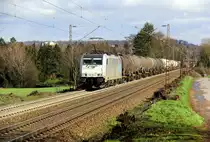 186 455-2 von Lineas/Railpool  kommt aus Richtung Aachen-West die Gemmenicher-Rampe hoch mit einem lagen Kesselzug aus Ludwigshafen-BASF nach Antwerpen-BASF(B) und fährt in Richtung Montzen/Belgien. 
Aufgenommen an der Montzenroute am Gemmenicher-Weg. 
Bei Sonne und Regenwolken am Vormittag vom 7.3.2019.