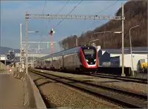 Der immer noch Neue. RABe 502 211 in Sch�nenwerd, im Hintergrund die Tunnelbaustelle, deren Gleise k�nftig die Viergleisigkeit zwischen Z�rich und Bern auf der gesamten Strecke herstellen wird. M�rz 2019.