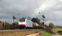 186 497-4 von Lineas/Railpool kommt aus Richtung Aachen-West die Gemmenicher-Rampe hoch mit einem lagen Kesselzug aus Ludwigshafen-BASF nach Antwerpen-BASF(B) und fährt in Richtung Montzen/Belgien. 
Aufgenommen an der Montzenroute am Gemmenicher-Weg. 
Bei Sonne und Regenwolken am Vormittag vom 8.3.2019.