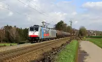 186 493-3 und 186 499-0 beide von DB-Schenker kommen die Gemmenicher-Rampe hochgefahren aus Richtung Aachen-West mit einem langen Ölleerzug aus Basel(CH) nach Antwerpen-Petrol(B) und fahren in Richtung Gemmenicher-Tunnel,Botzelaer(B),Gemmenich(B),Nouvelaer(B),Moresnet(B),Moresnet-Chapelle(B),Montzen(B). Aufgenommen an der Montzenroute am Gemmenicher-Weg. 
Bei Sonne und Regenwolken am Mittag vom 8.3.2019.