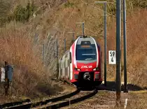 Auf dem renoviertem Wanderweg zwischen Goebelsm�hle und Kautenbach kann die luxemburgische Nordstrecke bei Kilometer 59,4 zusammen mit dem CFL KISS Z 2301 fotografisch festgehalten werden. 30.03.2019 (Hans)