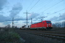 185 216 der DB unterwegs mit einem nicht ganz alltäglichen Mischer auf dem Weg von Oberhausen West über den Abzweig Ruhrtal in Richtung Lotharstraße, hinter der Lok befand sich am 5.3.19 noch eine Class 66 der ECR. 