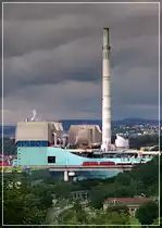 Am Kraftwert Münster - 

Zwei Lokomotiven der Baureihe 140 ziehen ein Güterzug über das Neckartalviadukt vor dem Kraftwerk Münster. 

21.06.2007 (M)