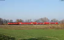 RE 3228 (Lindau-Aulendorf) mit Schublok 218 409-1 bei Eriskirch 29.3.19