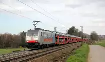 186 493-3 von DB-Schenker kommt aus Richtung Aachen-West und fährt die Gemmenicher-Rampe hoch mit einem Landrover-Autozug aus Gelsenkirchen-Bismarck(D) nach Zeebrugge-Ramskapelle(B) und fährt in Richtung Montzen/Belgien. 
Aufgenommen an der Montzenroute am Gemmenicher-Weg.  
Bei Sonne und Wolken am Nachmittag vom 24.3.2019.