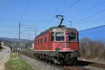 Re 620 089-3 fährt Richtung Bahnhof Lausen. Die Aufnahme stammt vom 21.03.2019.