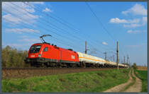 1116 198 der ÖBB zieht am 07.04.2019 einen Gaskesselzug durch die Magdeburger Börde bei Wellen Richtung Westen. 