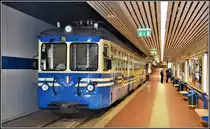 ABe 8/8 22  Ticino  fährt ab der unterirdischen Station Domodossola um 13.53 als Schülerzug Reg763 bis nach Re. (10.04.2019)