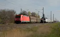 185 305 begegnete am 11.04.19 in Braschwitz dem IC 2046. Während der IC Richtung Köthen unterwegs war, rollte die Traxx mit ihrem Mischer gen Halle(S).