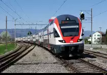SBB - Triebzug RABe 511 014 Unterwegs als RE nach Bern bei der Durchfahrt in Busswil am 20.04.2019