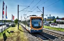 Der rnv-Tramwagen 4144, fährt als Linie 5 (Weinheim, Alter OEG-Bahnhof - Heidelberg - Mannheim - Weinheim, Händelstraße), nahe der Haltestelle Viernheim, Tivoli (RNZ) vorüber.
Aufgenommen am 20.4.2019.