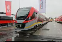 2 141 062-1 (36WEd 002B | Newag Impuls 2) steht auf dem Gleis- und Freigelände der Messe Berlin anlässlich des  Tags des Eisenbahners  im Rahmen der Publikumstage zur InnoTrans 2018.
Weitere Informationen zum Fahrzeug:
https://www.virtualmarket.innotrans.de/de/IMPULS-36WE,dct5-246
[23.9.2018 | 14:55 Uhr]