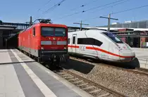 112 122 trifft am 19.4.2019 mit dem RE3 (RE3310) von Lutherstadt Wittenberg Hauptbahnhof nach Stralsund Hauptbahnhof in Berlin Gesundbrunnen auf 412 008 (5812 008-1) als ICE694 von Stuttgart Hauptbahnhof.