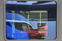 Spiegelungen und Durchblicke – fotografische Spielerei am Grazer Hbf., 26.04.2019