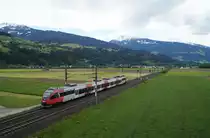 Mit Blick auf die umliegenden Berge konnte am 18. Mai 2019 bei Vomp auch der 4024 059-0 angetroffen werden, als er sich als REX 5351 auf der Fahrt vom Brenner nach Kufstein befand.