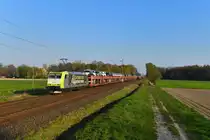 185 548 mit einem Autozug am 16.04.2019 bei Woltorf. 