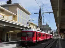 RE 1026 mit Be 4/4 511 am Zugende nach Klosters Platz kurz vor Abfahrt in Davos, 11.06.2019
