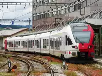ET 197 der tpf steht in Bulle abfahrtbereit als RE nach Bern, 15.06.2019.