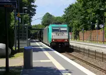 186 207 von der Rurtalbahn-Cargo kommt mit einem Autoleerzug aus Belgien nach Passau und kommt aus Richtung Aachen-West,Aachen-Schanz,Aachen-Hbf,Aachen-Rothe-Erde und fährt durch Aachen-Eilendorf in Richtung Stolberg-Hbf(Rheinland)Eschweiler-Hbf,Langerwehe,Düren,Merzenich,Buir,Horrem,Kerpen-Köln-Ehrenfeld,Köln-West,Köln-Süd. Aufgenommen vom Bahnsteig 2 in Aachen-Eilendorf.
Bei Sommerwetter am Mittag vom 14.6.2019.