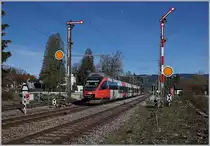 Der ÖBB ET 4024 099-6 passiert die Einfahrsignale von Lindau Reutin und erreicht in Kürze sein Ziel Lindau Hbf. 

16. März 2019