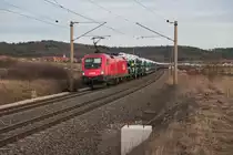 1116 151 mit einem Autotransportzug bei Mitteldachstetten Richtung Würzburg, 23.02.2019