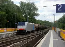 186 445-3 von Lineas/Railpool kommt als umleiter aus Richtung Aachen-Wes,Laurensberg,Richterich mit einem gemischten Güterzug aus Antwerpen-Noord(B) nach Köln-Gremberg(D) und fährt durch Kohlscheid in Richtung Herzogenrath,Mönchengladbach. 
Aufgenommen von Bahnsteig 2 in Kohlscheid. 
Bei Sommerwetter am Mittag vom 21.6.2019. 
