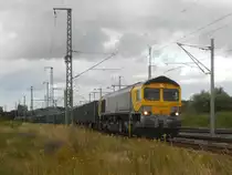 Den ganzen 02.Juli 2019 stand die BRLL 266 115 in Bergen/Rügen.Hier erwischte ich die Lok mit leeren Kieszug bei der Ausfahrt aus Bergen/Rügen.