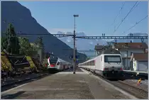 Die SBB Re 460 113-1 mit SEV Werbung schiebt ihren IR 1711 in Villeneuve Richtung Brig.

1. Juli 2019