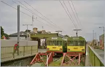 In Howth / Binn Éadair warten die beiden DART Triebzüge 8123 und 8130 auf ihre Abfahrt Richtung Dublin. 

14. Mai 2004 