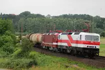 243 822+243 936 am 16.07.2019 mit Kesselwagen bei Friedland.