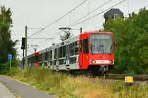 2327 wurde eine neue Teilreklame  De Rucci  angebracht. Hier zu sehen in Godorf am 16.07.2019.
