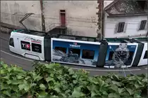 Verbogene Straßenbahn -

... aber keine verzerrte Spiegelung, sondern in Wirklichkeit so.

Felixity-Tram am Kohlenberg in Basel.

09.03.2019 (M)