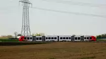 Ein Zug der Baureihe 622 fährt durch die Kurve kurz nach dem Abzweig der Strecke in Richtung Bürstadt. Unterwegs ist dieser Zug als RB 13826 (RB 63) nach Bensheim. Aufgenommen am 17. April 2019.